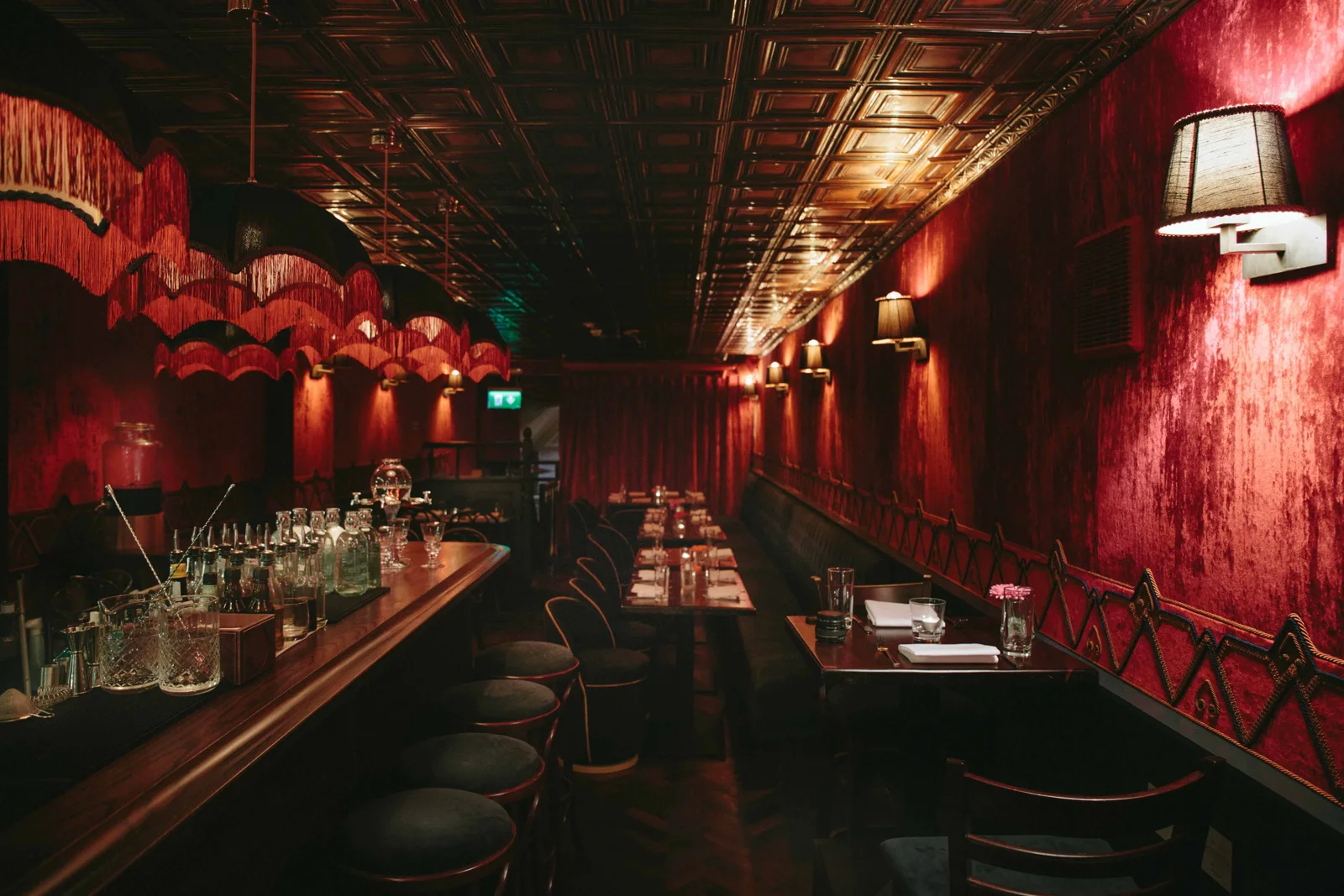 Red velvet walls and a copper ceiling in The Little Pig's intimate Dublin speakeasy